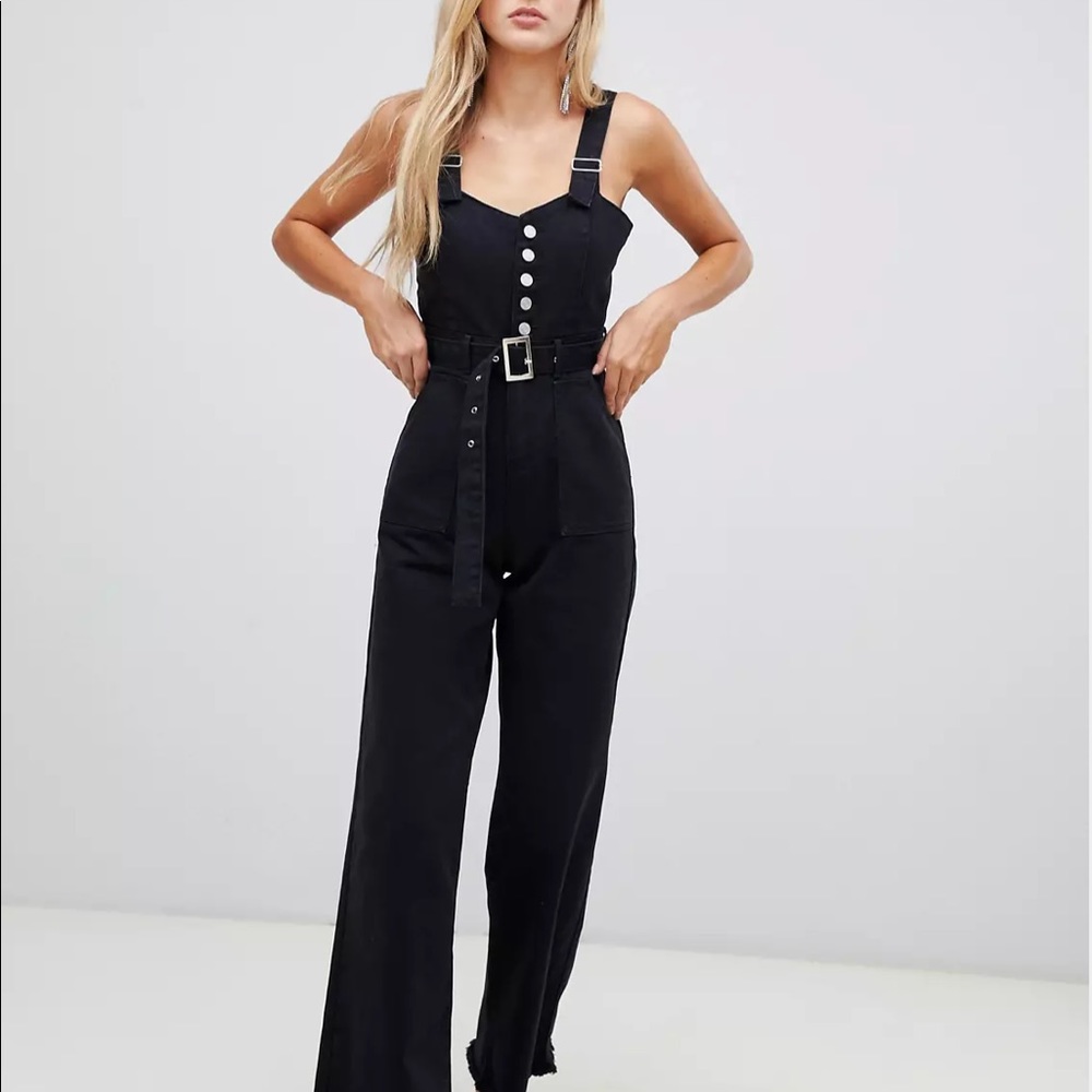 Black denim jumpsuit with overall straps